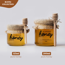 Load image into Gallery viewer, Rustic: 𝗣𝗨𝗥𝗘 𝗛𝗢𝗡𝗘𝗬 in winnie the pooh jars (125ml, 200ml)
