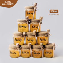 Load image into Gallery viewer, Rustic: 𝗣𝗨𝗥𝗘 𝗛𝗢𝗡𝗘𝗬 in winnie the pooh jars (125ml, 200ml)
